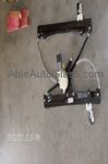 A window regulator is a device that carries the window up 
and down when in operation. Most vehicles today window regulators are made with a metal frame, plastic pulleys, plastic retainers where the glass attaches to, and a motor.